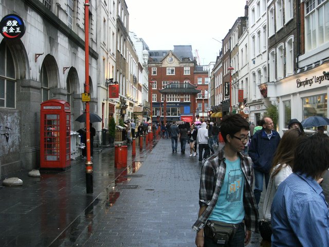 Gerrard Street in Chinatown, its lanterns strung between the buildings, looking towards Wardour Street