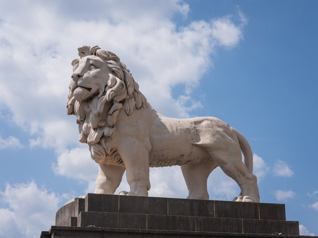 The South Bank Lion, a Coade stone lion on a plinth at the south-east end of Westminster Bridge
