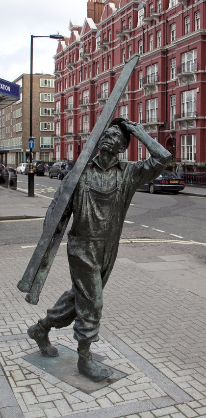 The Window Cleaner, a bronze figure on a ladder with a bucket, on Chapel Street in Marylebone